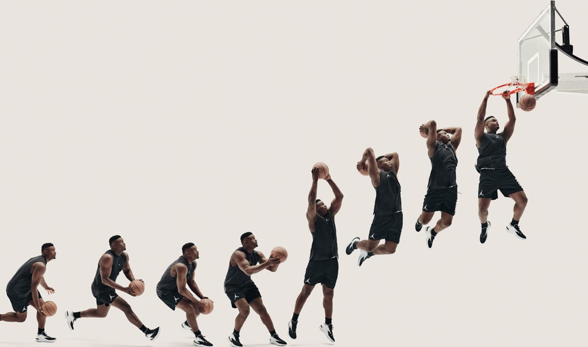 Home page banner of basketball athelete Zion Williamson going for a dunk