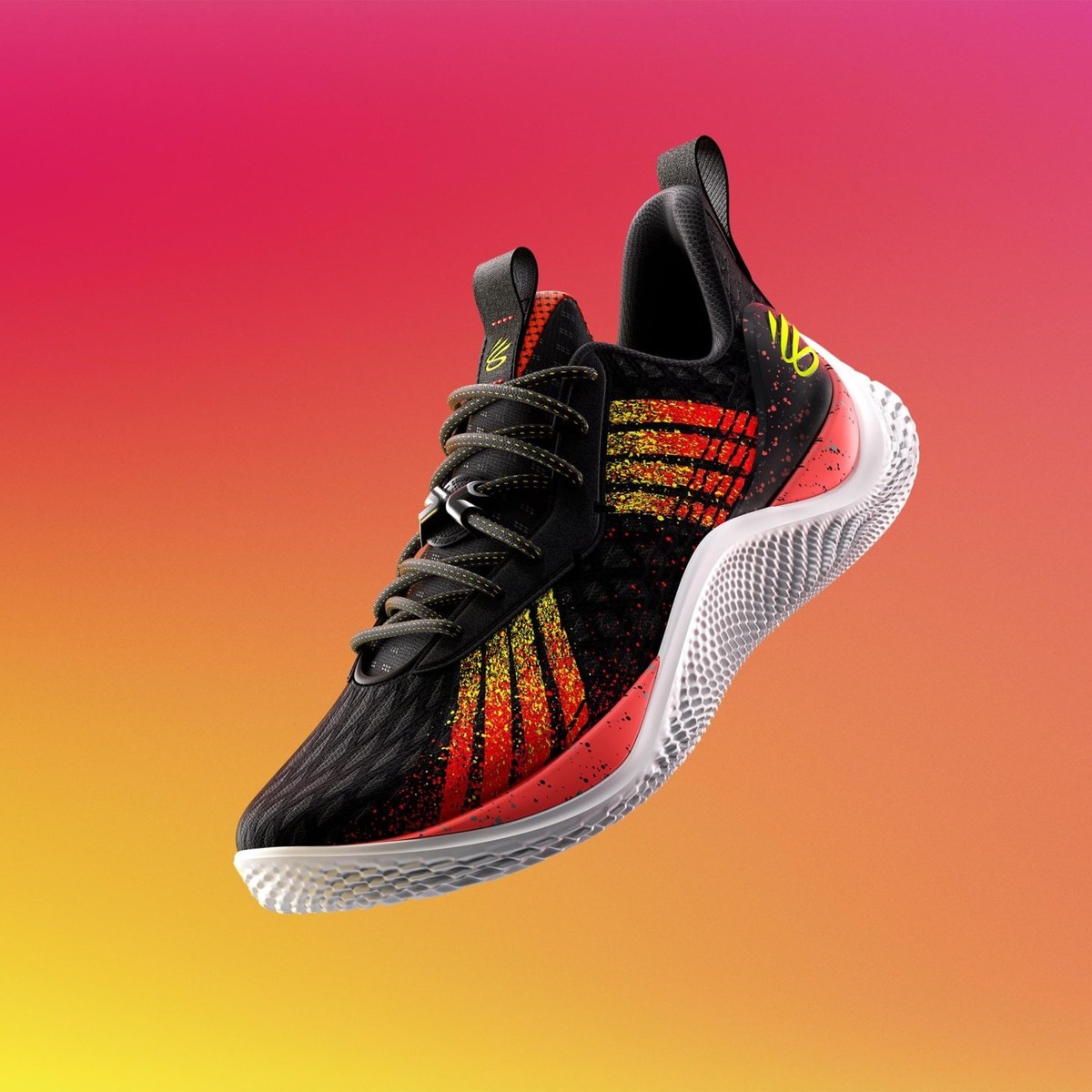 Stephen Curry 8s black and orange colorway over yellowish orange background