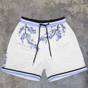 White and blue floral basketball shorts over grey background